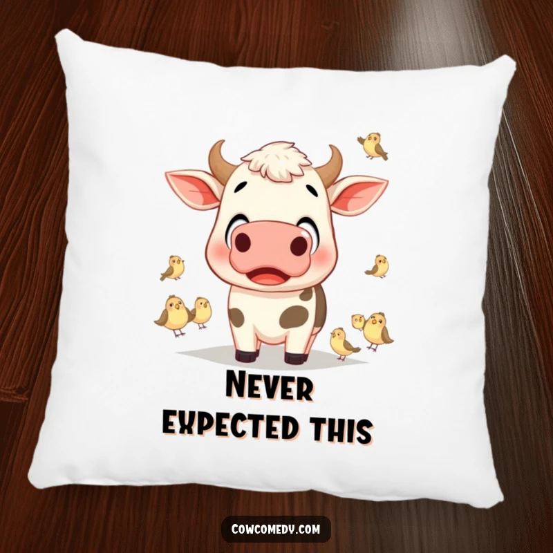 Funny cow with wide, surprised eyes watching small birds on a plush pillow, perfect for cozying up.