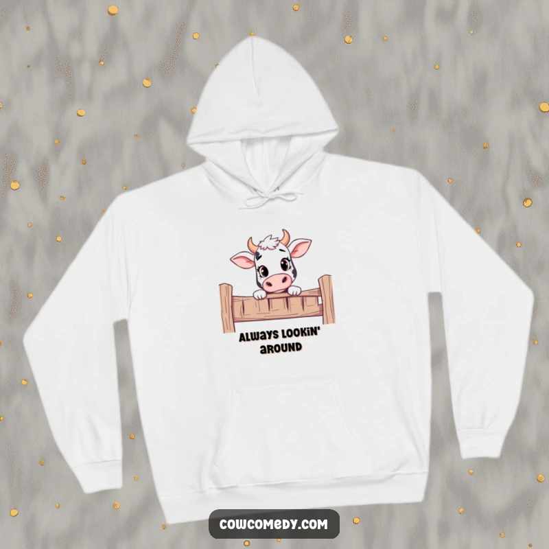 Funny hoodie depicting a curious cow peeking over a fence with a look of mild intrigue.