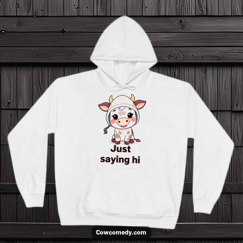 Funny Mooing Cow Kid Hoodie: a cute cow child in a bonnet, offering a friendly 'moo', providing warmth and heartwarming charm.