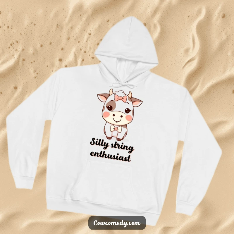 Funny Kawaii cow hoodie with a happy grinning cow wearing a large, silly bow, radiating cheerfulness.
