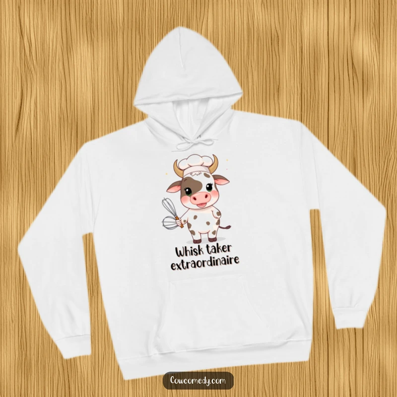 Funny cow chef with a giant whisk on a cozy hoodie, exuding playful kitchen charm, great for humorous gift seekers.