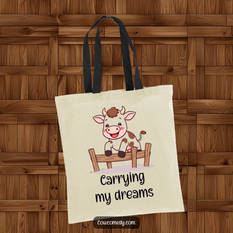 Funny kawaii cow tote bag with a cute cow leaping energetically over a small fence, perfect for carrying essentials with flair.