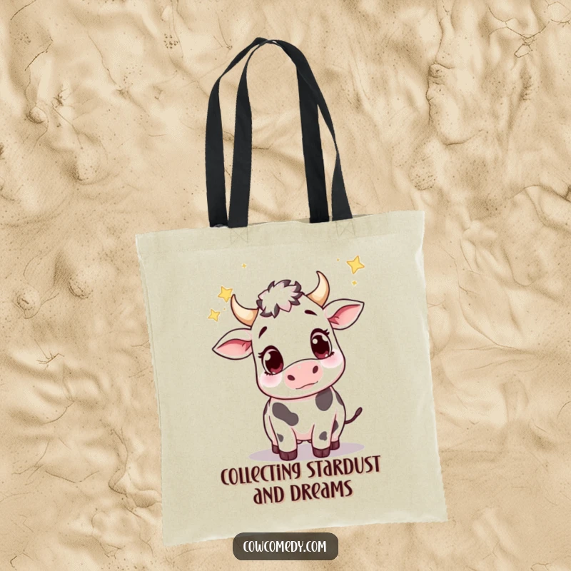 Funny tote bag showcasing a cute cow with wide, wondering eyes, playfully trying to catch falling stars from the night sky.